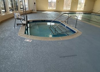 indoor pool deck in Peking Blue and Franciscan Tan