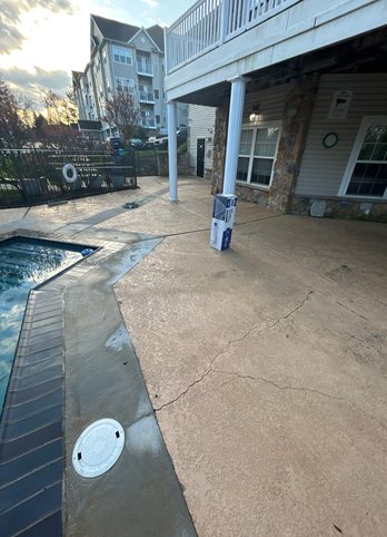 apartment pool deck before resurfacing