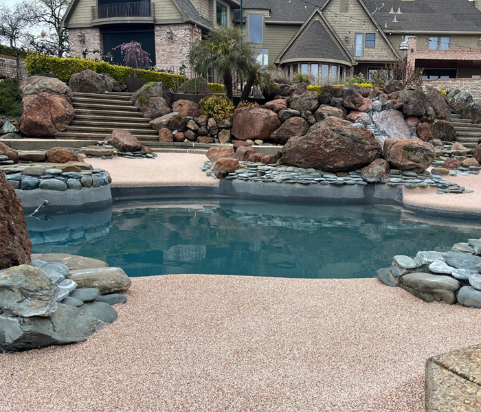 Custom Swimming Pool, Natural Rock Features, Safety Surfacing
SunPlay
Sundek